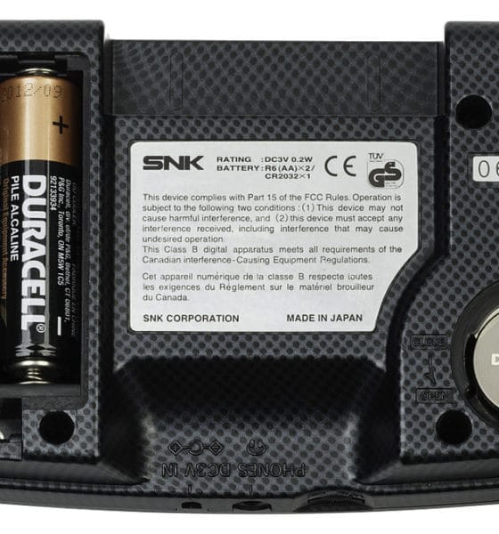 The back of a Neo Geo Pocket Color, a handheld gaming console released by SNK in 1999. This picture shows the both battery compartment covers removed and with batteries inserted. The Pocket Color uses two AA batteries for gameplay and one 2032 button cell battery for an internal clock. - Photo Credit: Evan Amos via Wikimedia.org